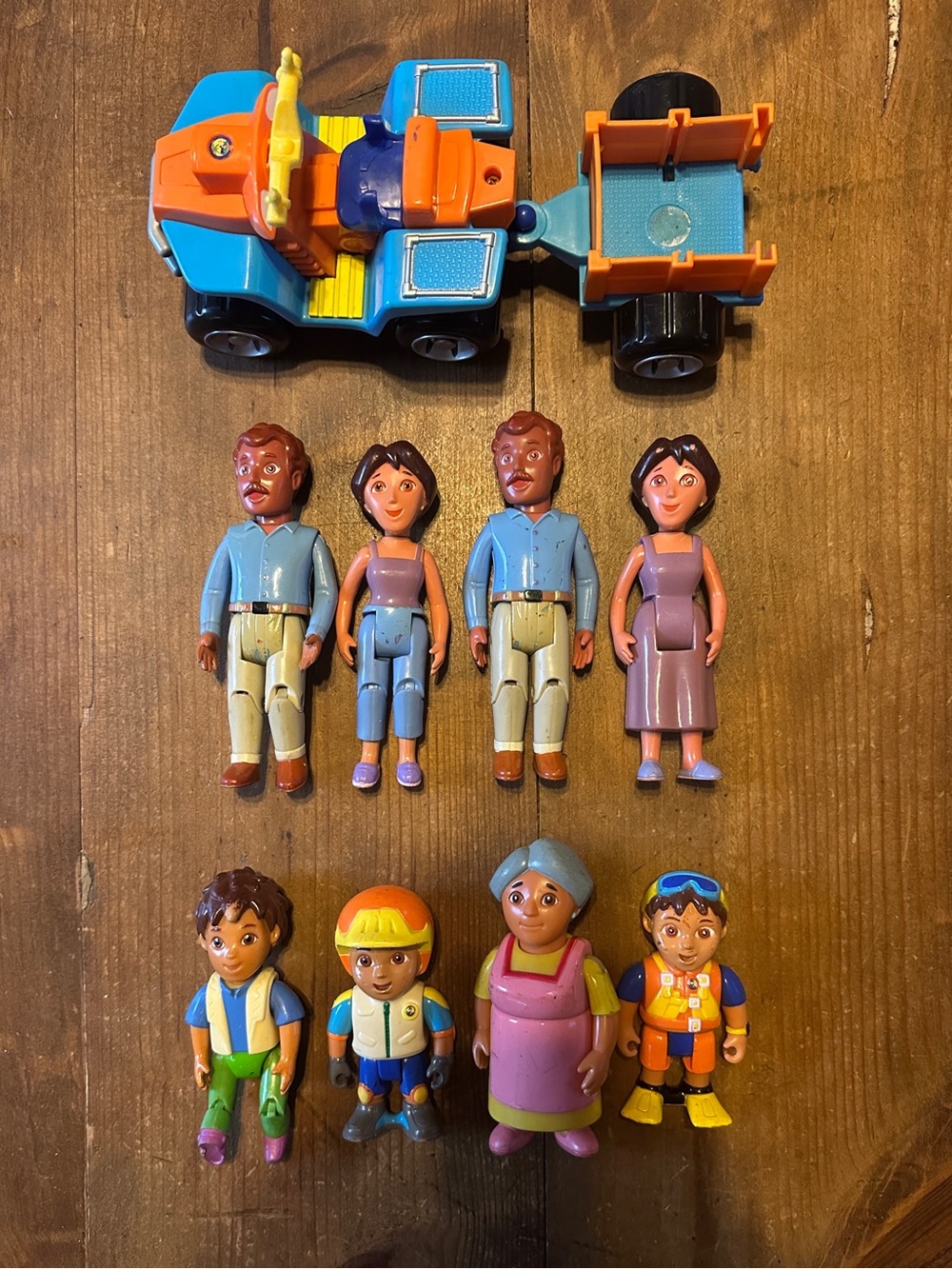 Vintage Dora the Explorer action figure set with 8 figures and a vehicle